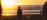 Man Looking Out To Sea With Sunrise Hero