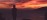 Man Trekking Along Coastal Path Sunrise Hero
