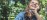 Wellness practitioner gathered in presence - soft particle composite overlay