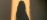 Practitioner’s full shadow cast flat across a light floor