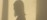 Shadow of practitioner at rest against a wall