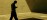 Practitioner silhouette in a quiet exterior courtyard