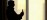 Interior silhouette of practitioner with arm extended