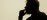 Interior silhouette of practitioner facing directly into light
