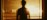 Interior silhouette of practitioner below a skylight